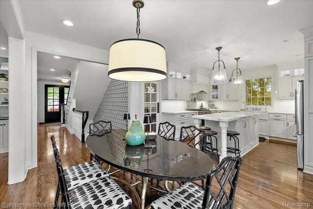 364 Chesterfield Ave, Birmingham, MI 48009 - dining room with healthy amount of natural light, dark wood finished floors, and recessed lighting