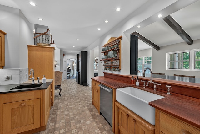 3420 Grange Rd, Berrien Springs, MI 49103 - kitchen featuring stainless steel dishwasher, recessed lighting, backsplash, brick patterned flooring, and beam ceiling