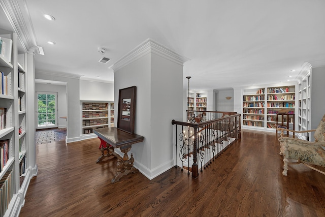 3420 Grange Rd, Berrien Springs, MI 49103 - corridor with crown molding, an upstairs landing, built in features, wood finished floors, and recessed lighting