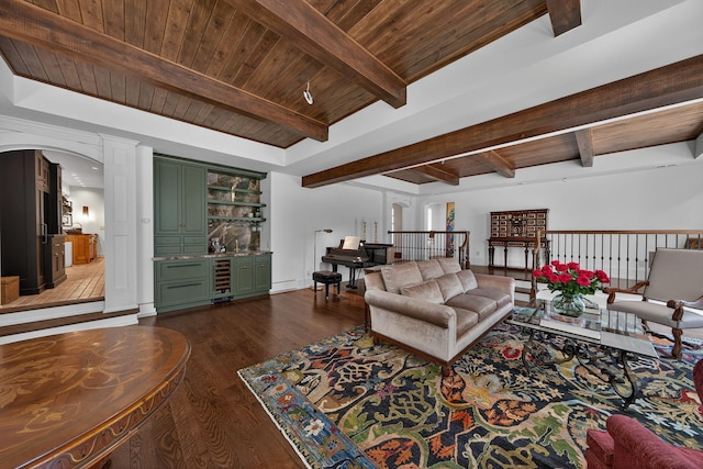 3420 Grange Rd, Berrien Springs, MI 49103 - living room with bar with sink, wine cooler, dark wood-type flooring, arched walkways, and a wood ceiling with exposed beams