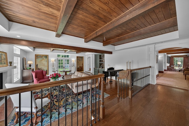 3420 Grange Rd, Berrien Springs, MI 49103 - living room featuring arched walkways, hardwood / wood-style flooring, plenty of natural light, and a wood ceiling with exposed beams