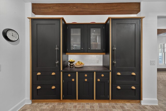 3420 Grange Rd, Berrien Springs, MI 49103 - bar featuring baseboards and tasteful backsplash