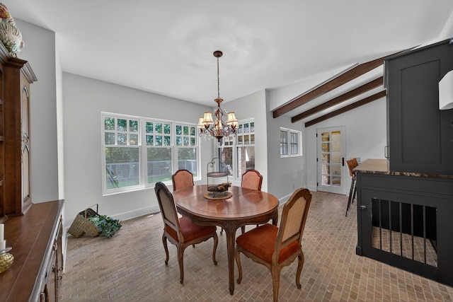 3420 Grange Rd, Berrien Springs, MI 49103 - dining space featuring a chandelier and baseboards