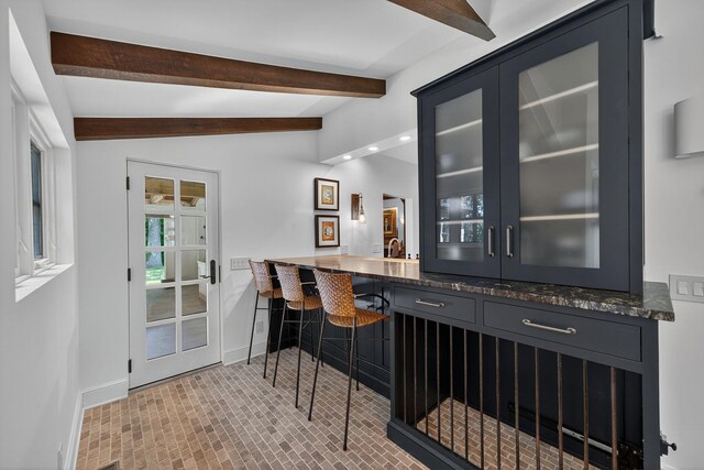 3420 Grange Rd, Berrien Springs, MI 49103 - bar with baseboards and brick patterned floors