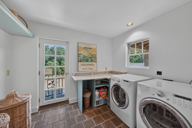 3420 Grange Rd, Berrien Springs, MI 49103 - laundry room featuring separate washer and dryer, plenty of natural light, recessed lighting, and dark stone finish floors
