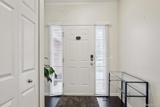 170 W Reed Lake Ct, Commerce Twp, MI 48390 - entrance foyer with dark wood-style flooring