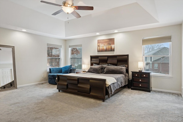 170 W Reed Lake Ct, Commerce Twp, MI 48390 - bedroom featuring light colored carpet, a raised ceiling, a ceiling fan, and recessed lighting