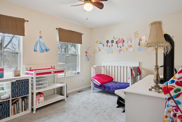 170 W Reed Lake Ct, Commerce Twp, MI 48390 - bedroom featuring multiple windows, carpet, and a ceiling fan
