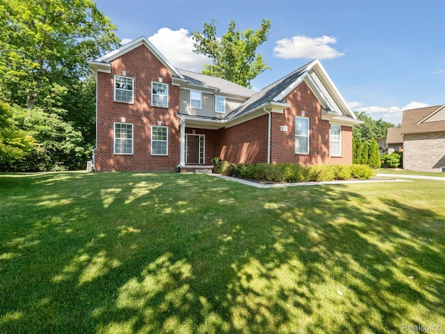 170 W Reed Lake Ct, Commerce Twp, MI 48390 - traditional-style home with a front lawn and brick siding