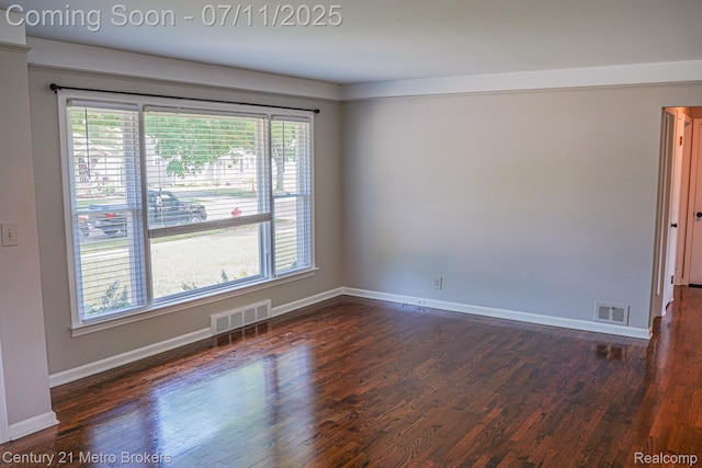 338 N Dr, Davison, MI 48423 - spare room featuring dark wood finished floors