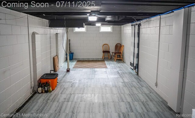 338 N Dr, Davison, MI 48423 - basement featuring concrete block wall and tile patterned floors