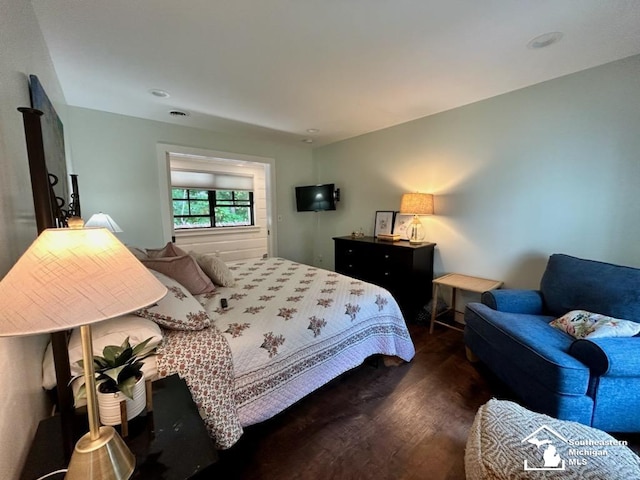 314 W Division St, Boyne City, MI 49712 - bedroom featuring wood finished floors