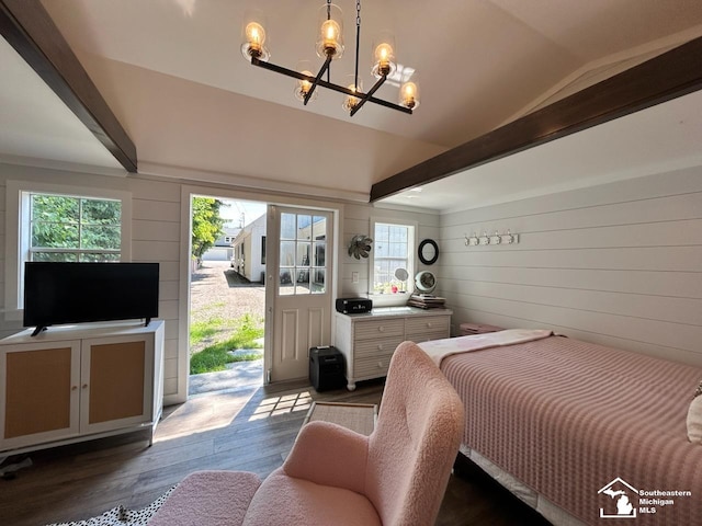 314 W Division St, Boyne City, MI 49712 - bedroom featuring access to outside, wood finished floors, a chandelier, beamed ceiling, and wood walls