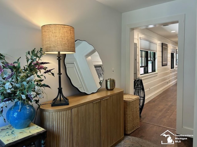 314 W Division St, Boyne City, MI 49712 - corridor featuring baseboards and dark wood-type flooring