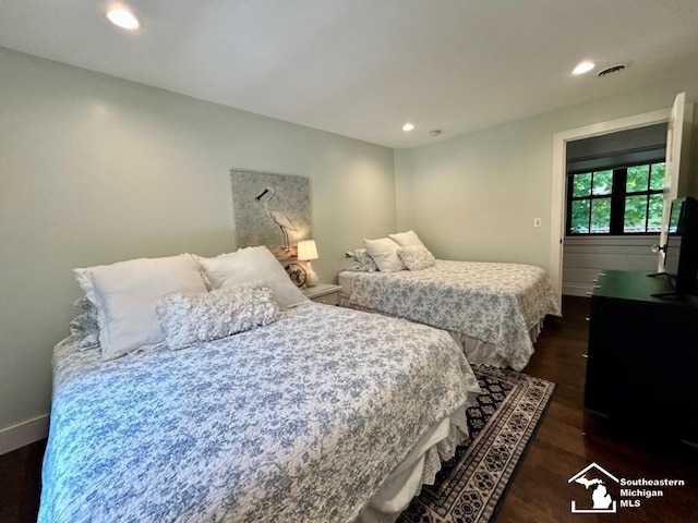 314 W Division St, Boyne City, MI 49712 - bedroom featuring recessed lighting and dark wood finished floors