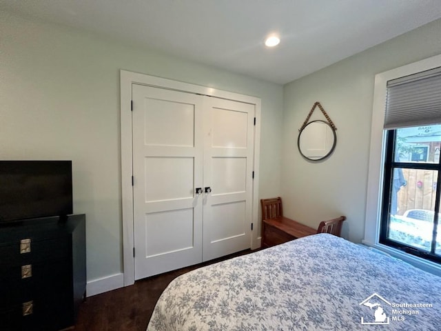 314 W Division St, Boyne City, MI 49712 - bedroom featuring dark wood-type flooring, a closet, and recessed lighting