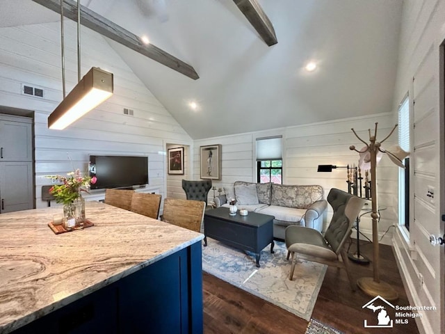 314 W Division St, Boyne City, MI 49712 - living room with dark wood-style flooring, high vaulted ceiling, wood walls, beamed ceiling, and recessed lighting