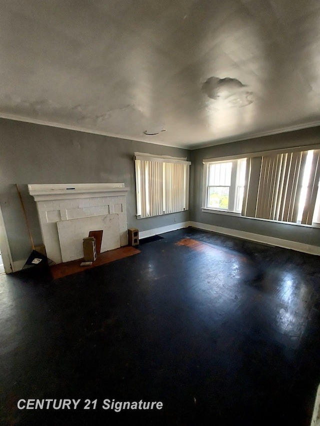 1205 Copeman Blvd, Flint, MI 48504 - unfurnished living room with crown molding and baseboards
