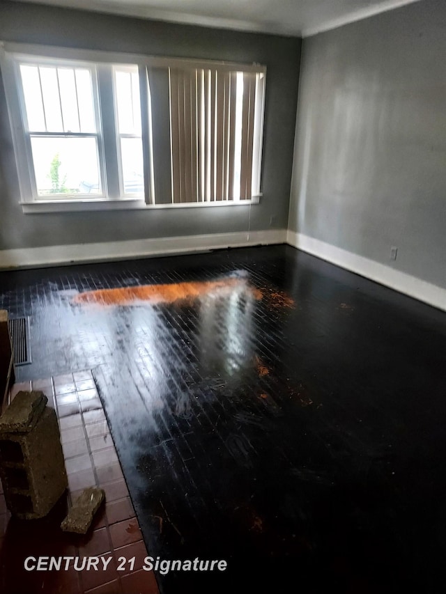 1205 Copeman Blvd, Flint, MI 48504 - empty room with wood finished floors