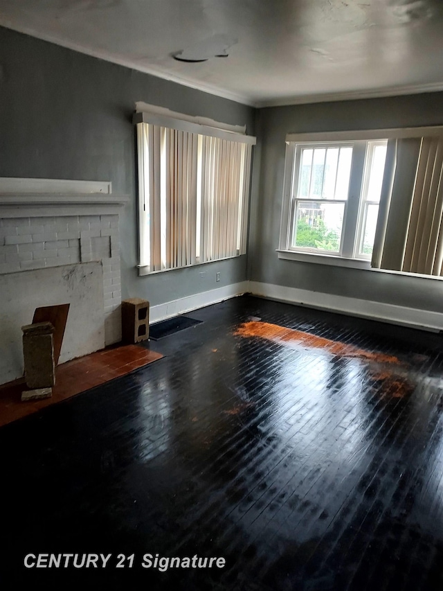 1205 Copeman Blvd, Flint, MI 48504 - unfurnished living room featuring wood-type flooring and crown molding
