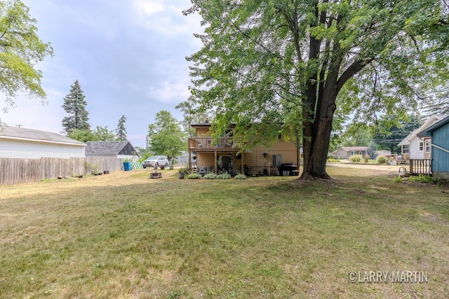 3607 Colby Ave SW, Wyoming, MI 49509 - view of yard featuring a deck