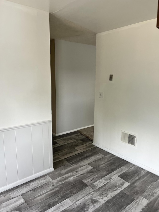 3607 Colby Ave SW, Wyoming, MI 49509 - spare room with dark wood-style flooring