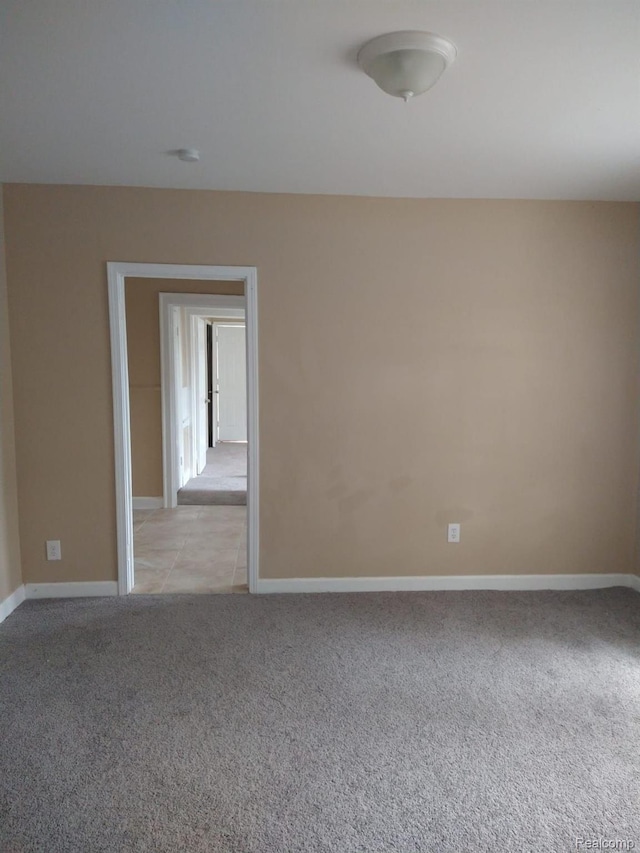 13340 Hartwell St, Detroit, MI 48227 - spare room featuring light carpet and baseboards
