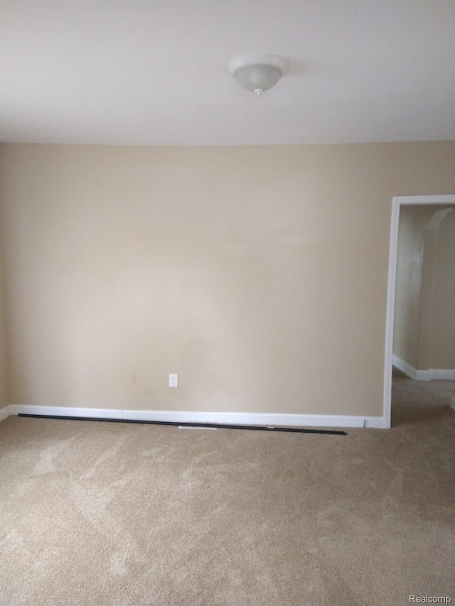 13340 Hartwell St, Detroit, MI 48227 - carpeted empty room featuring baseboards