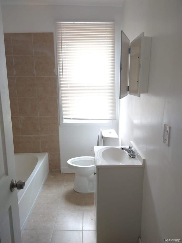 13340 Hartwell St, Detroit, MI 48227 - bathroom featuring vanity, a tub, and tile patterned flooring