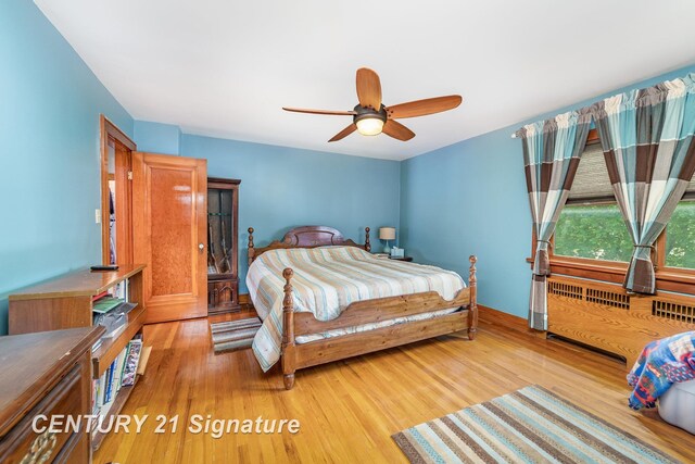 9610 Saginaw St, Reese, MI 48757 - bedroom featuring light wood finished floors and ceiling fan