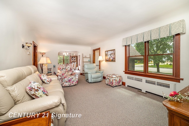 9610 Saginaw St, Reese, MI 48757 - carpeted living room featuring radiator heating unit