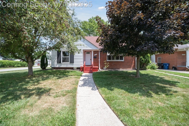 19190 Woodworth, Redford, MI 48240 - view of front of home featuring a front yard and brick siding