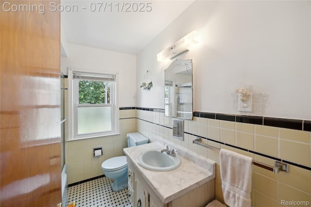 19190 Woodworth, Redford, MI 48240 - bathroom with tile walls, vanity, and a wainscoted wall