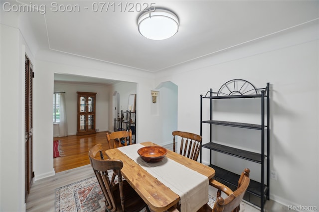 19190 Woodworth, Redford, MI 48240 - dining area with arched walkways and light wood-type flooring
