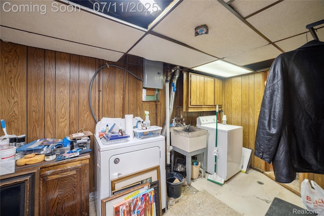 19190 Woodworth, Redford, MI 48240 - washroom featuring wood walls, cabinet space, electric panel, and washer and clothes dryer