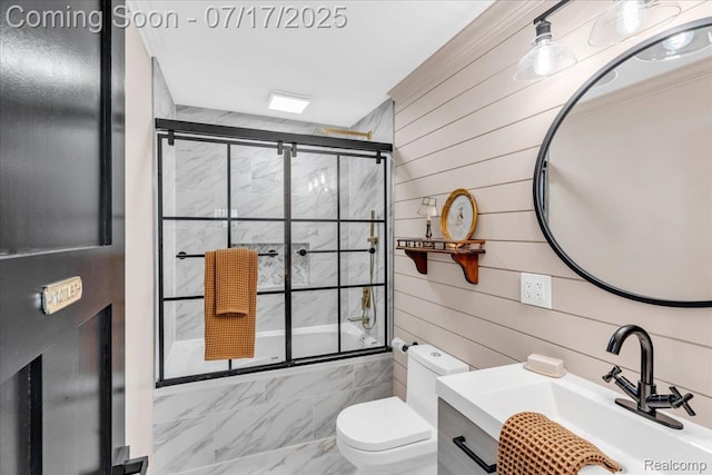 1133 Kingston Ave, Flint, MI 48507 - full bathroom featuring tiled shower / bath combo, wood walls, vanity, and marble finish floors