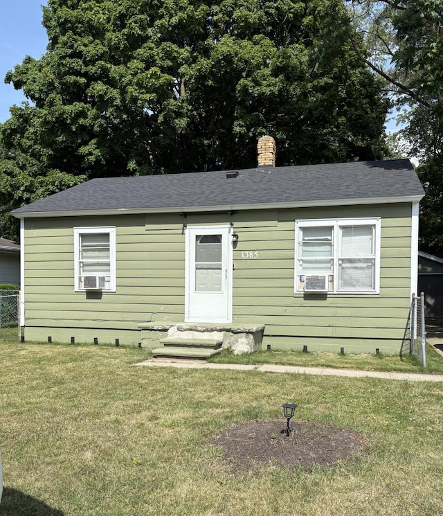 1385 Superior St, Benton Harbor, MI 49022 - view of front of house with crawl space, a chimney, roof with shingles, and entry steps