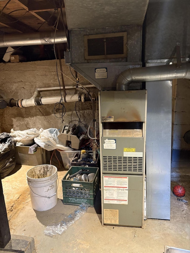 1993 Taube Ave, Benton Harbor, MI 49022 - utility room with heating unit