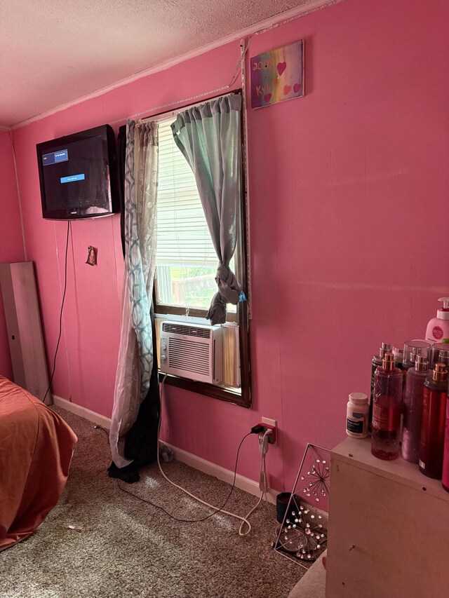 1993 Taube Ave, Benton Harbor, MI 49022 - bedroom with a textured ceiling, carpet, and cooling unit