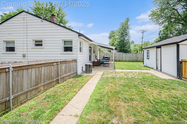 1510 S Harris Rd, Ypsilanti, MI 48198 - fenced backyard featuring a patio area