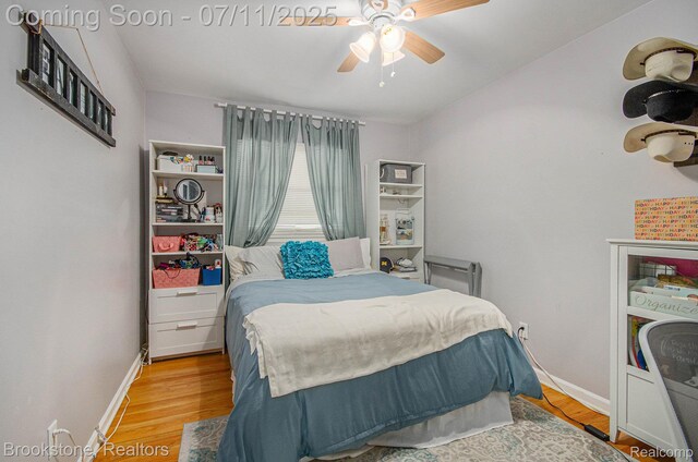 1510 S Harris Rd, Ypsilanti, MI 48198 - bedroom featuring wood finished floors and a ceiling fan