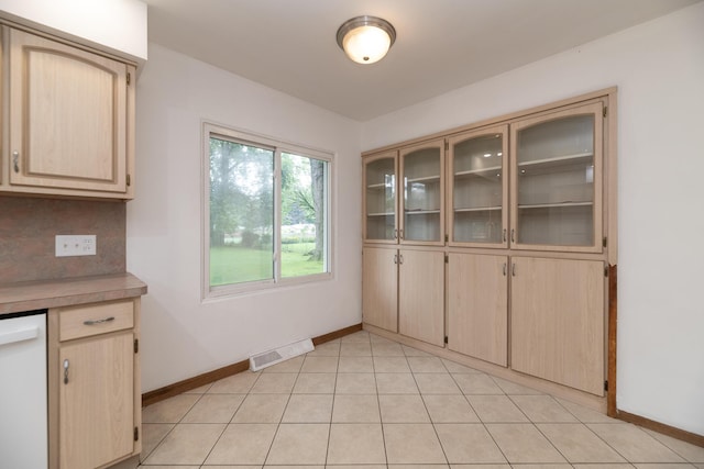 3026 Leigh Ave, Kalamazoo, MI 49048 - unfurnished dining area with baseboards