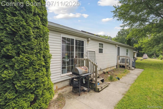 3410 Eastdale Dr, Flint, MI 48506 - view of property exterior with a lawn