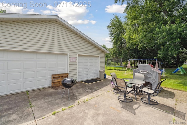 3410 Eastdale Dr, Flint, MI 48506 - garage featuring a trampoline