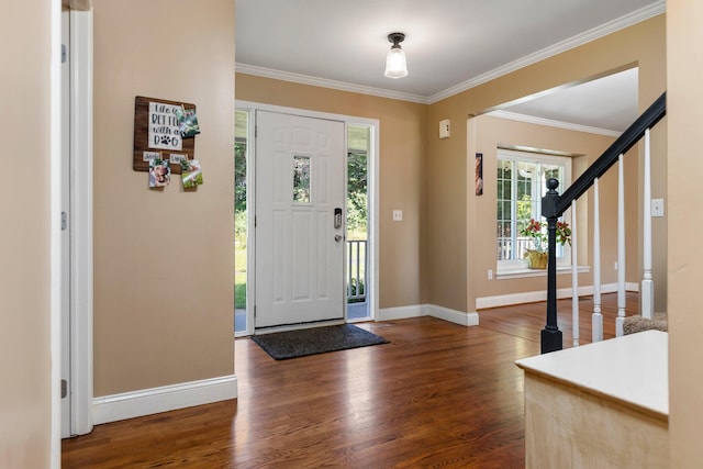 2017 Cumberland Dr, Brighton, MI 48114 - foyer with healthy amount of natural light, wood finished floors, crown molding, and stairs
