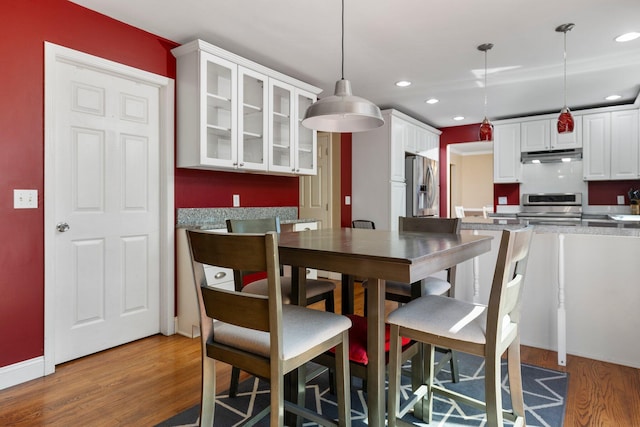 2017 Cumberland Dr, Brighton, MI 48114 - dining room featuring light wood-style flooring and recessed lighting