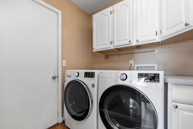2017 Cumberland Dr, Brighton, MI 48114 - laundry room with cabinet space and separate washer and dryer