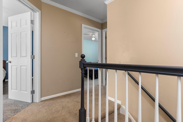 2017 Cumberland Dr, Brighton, MI 48114 - hall featuring carpet floors, ornamental molding, and an upstairs landing