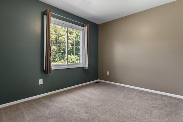 2017 Cumberland Dr, Brighton, MI 48114 - carpeted empty room featuring baseboards and a ceiling fan