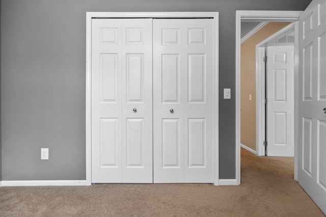 2017 Cumberland Dr, Brighton, MI 48114 - unfurnished bedroom featuring carpet flooring, a closet, and ornamental molding